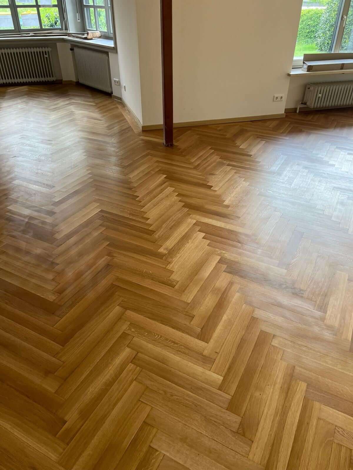Parquet floor after sanding and renovation in Munich